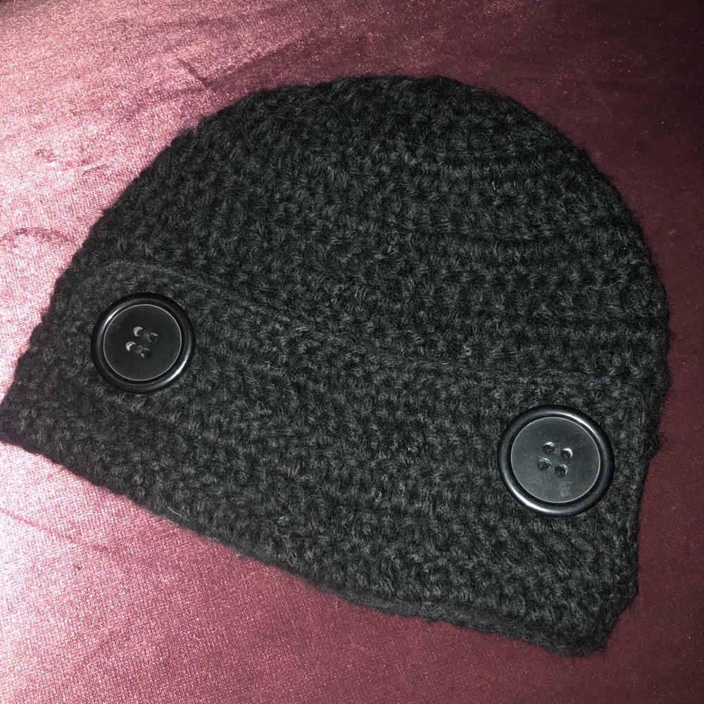 Black knit beanie with button accents